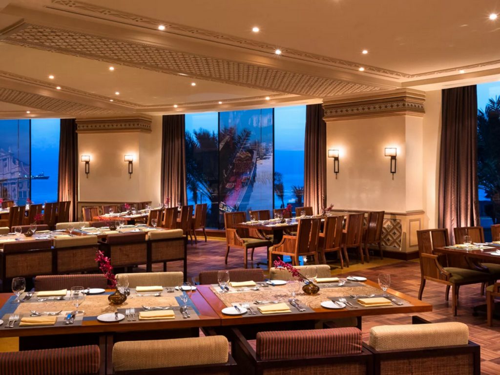 Family-friendly restaurants in Jeddah: Rosewood Jeddah indoor tables with beige walls